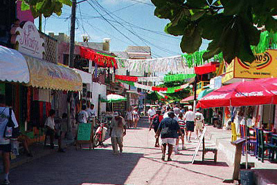 Small streets are busy with shoppers.