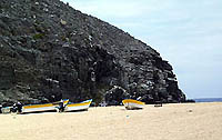 Fishing pangas lying on the Punta Lobos beach