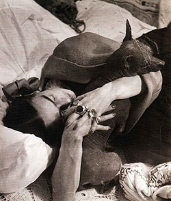 Frida Kahlo with her beloved Xolo