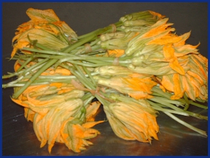 fresh squash blossoms waiting to become soup or stuffing